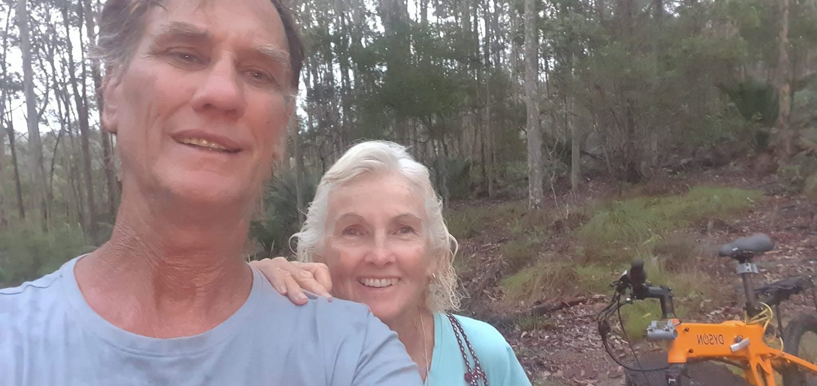 Paul and Joanne Hazzard with their bikes on North Stradbroke Island